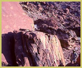 The pteroglyphs (rock art engavings) at Twyfelfontein world heritage site in the Damaraland region of northern Namibia are totally exposed to the weather at the head of a desert valley